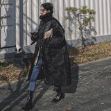 Damen wattierter Longline-Mantel mit hohem Stehkragen und Steppnähten – Schwarz