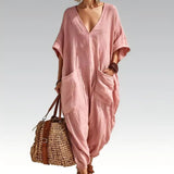 Evelisse - Luftiger Jumpsuit mit Fledermausärmeln und Taschen – Pink