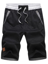 Eden | Knie-lange Shorts mit Kordelzug und Taschen – Schwarz