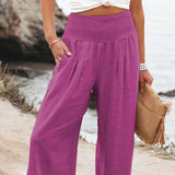 Damenhose aus Leinenmischung mit Smokarbeit und Taschen – Rosa