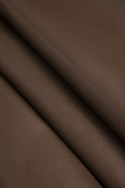 Marigold | Verspielter Kunstleder-Skaterrock mit High-Waist-Schnitt und ausgestelltem Saum