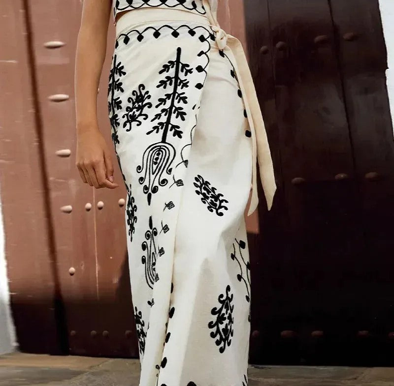 Charitini - Elegantes ärmelloses Oberteil Und Fließender Rock Im Satz