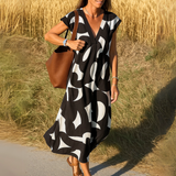 Tallisia - Midikleid mit V-Ausschnitt und weichem Griff – Schwarz