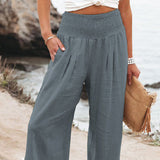 Damenhose aus Leinenmischung mit Smokarbeit und Taschen – Asche