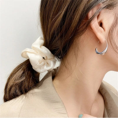 Luxusohrringe aus Gold und Silber