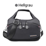 Oella | Diebstahlsichere Handtasche mit 10 Fächern – Hellgrau