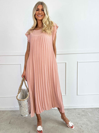 VALE | Nancy – The Long Pleated Dress with Ruffle Sleeves