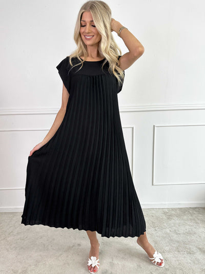 VALE | Nancy – The Long Pleated Dress with Ruffle Sleeves