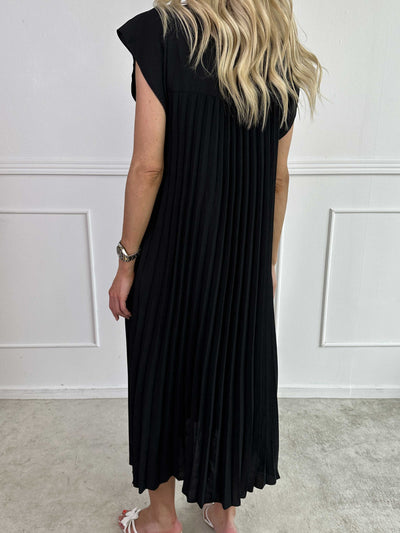 VALE | Nancy – The Long Pleated Dress with Ruffle Sleeves