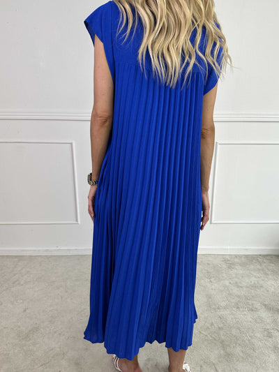 VALE | Nancy – The Long Pleated Dress with Ruffle Sleeves