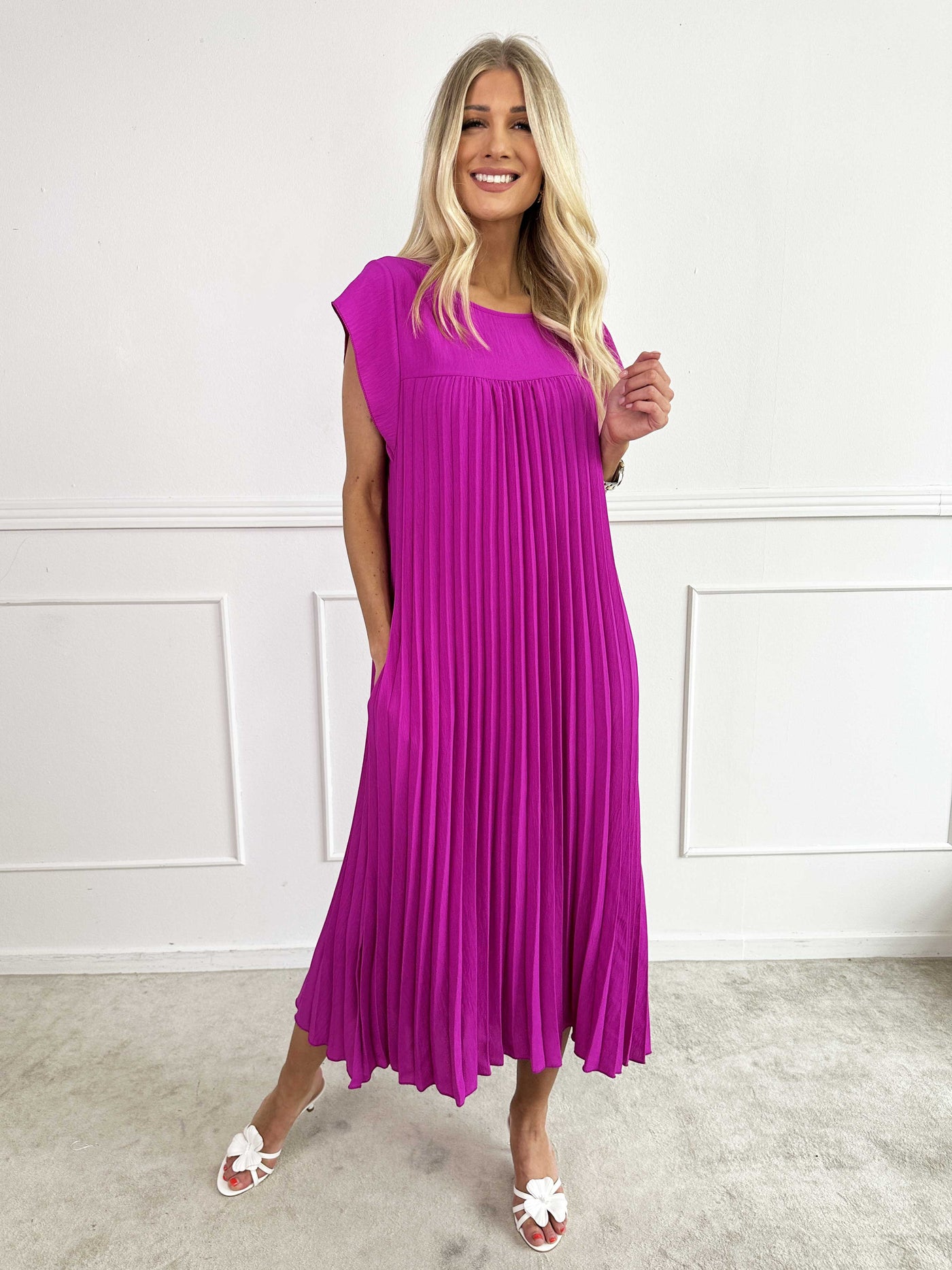 VALE | Nancy – The Long Pleated Dress with Ruffle Sleeves