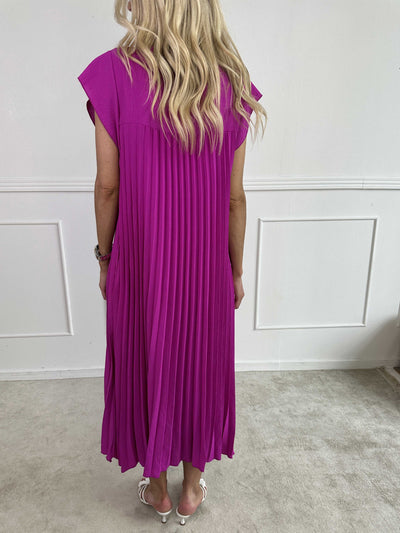 VALE | Nancy – The Long Pleated Dress with Ruffle Sleeves