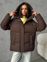 Damen Oversized Steppjacke mit Kapuze und integrierten Taschen – Braun