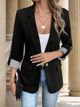 Damen nan taillierter dreiviertelarm Blazer mit Pattentaschen und umgeschlagenen Manschetten Drune – Schwarz