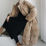Damen Maxi-Steppmantel mit hohem Stehkragen und winddichter Wattierung – Khaki