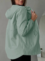 Damen Outdoorjacke mit anpassbarer Kapuze und geräumigen Taschen – Hellgrün