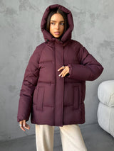 Damen Oversized Steppjacke mit Kapuze und integrierten Taschen – Weinrot