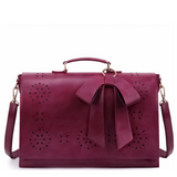 Bernadette – Schleifen-Satchel Handtasche – Pflaume