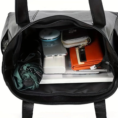 Maura - Lässige Vinyl-Tasche