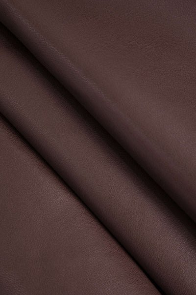 Marigold | Verspielter Kunstleder-Skaterrock mit High-Waist-Schnitt und ausgestelltem Saum