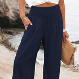 Damenhose aus Leinenmischung mit Smokarbeit und Taschen – Marineblau