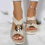 Calista – Keilsandalen mit Flechtdetail und Zierschnalle – Gold