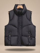 Nora | Damen Steppweste Bodywarmer mit hohem Stehkragen und Zierriemen – Schwarz