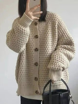 Damen Strickjacke mit Rundhalsausschnitt Knopfverschluss Ballonärmeln und Strukturmuster – Apricot