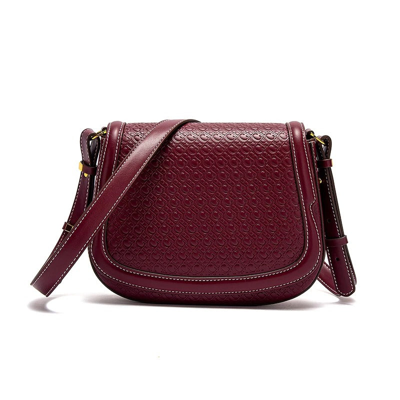 Helviora® | Geprägte Umhängetasche in Sattelform