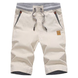 Eden | Knie-lange Shorts mit Kordelzug und Taschen – Creme