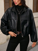 Damen cropped Kunstlederjacke mit Reißverschlusstaschen und tailliertem Schnitt – Schwarz