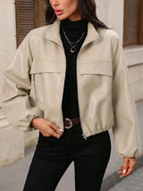 Damen cropped Kunstlederjacke mit Reißverschlusstaschen und tailliertem Schnitt – Milchweiß