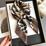 Noémie – Damen-Schal mit Animal-Print-Mix – Animal print
