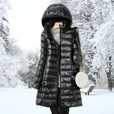 Ragnora | Damen Gesteppte Kapuzenjacke Winterjacke – Schwarz