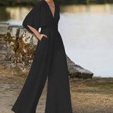 Damen-Jumpsuit mit V-Ausschnitt aus Baumwollmischung – Schwarz