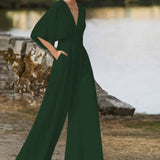 Damen-Jumpsuit mit V-Ausschnitt aus Baumwollmischung – Grün